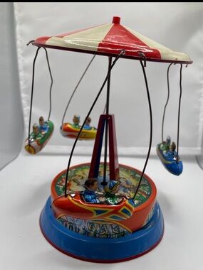 Vintage 7” tall tin Litho Merry go Round Carousel made in Germany as is